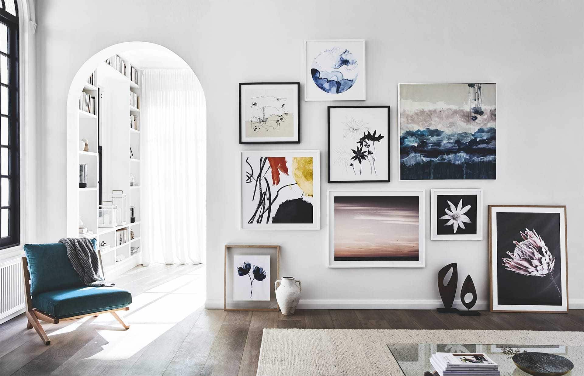 a Pro at Mixing Art on Gallery Walls TLC Interiors